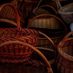 A close-up view of handcrafted wicker baskets showcasing intricate weaving patterns.